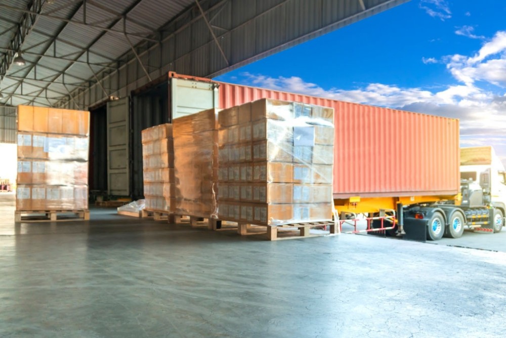 filled warehouse with a transporting machine